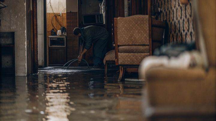 Crew pumping flood water from a property in Sweeny Texas