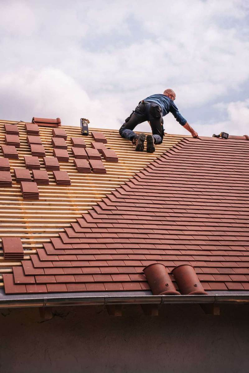 Roof shingles inspection after storm damage in Springtown Texas